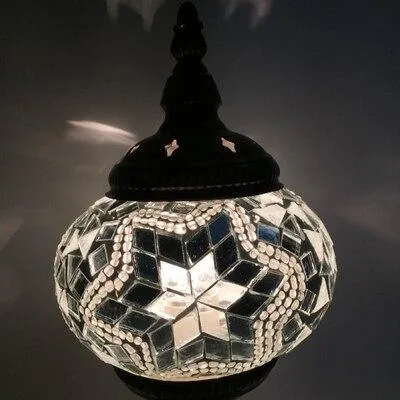 Hand-inlaid glass mosaic