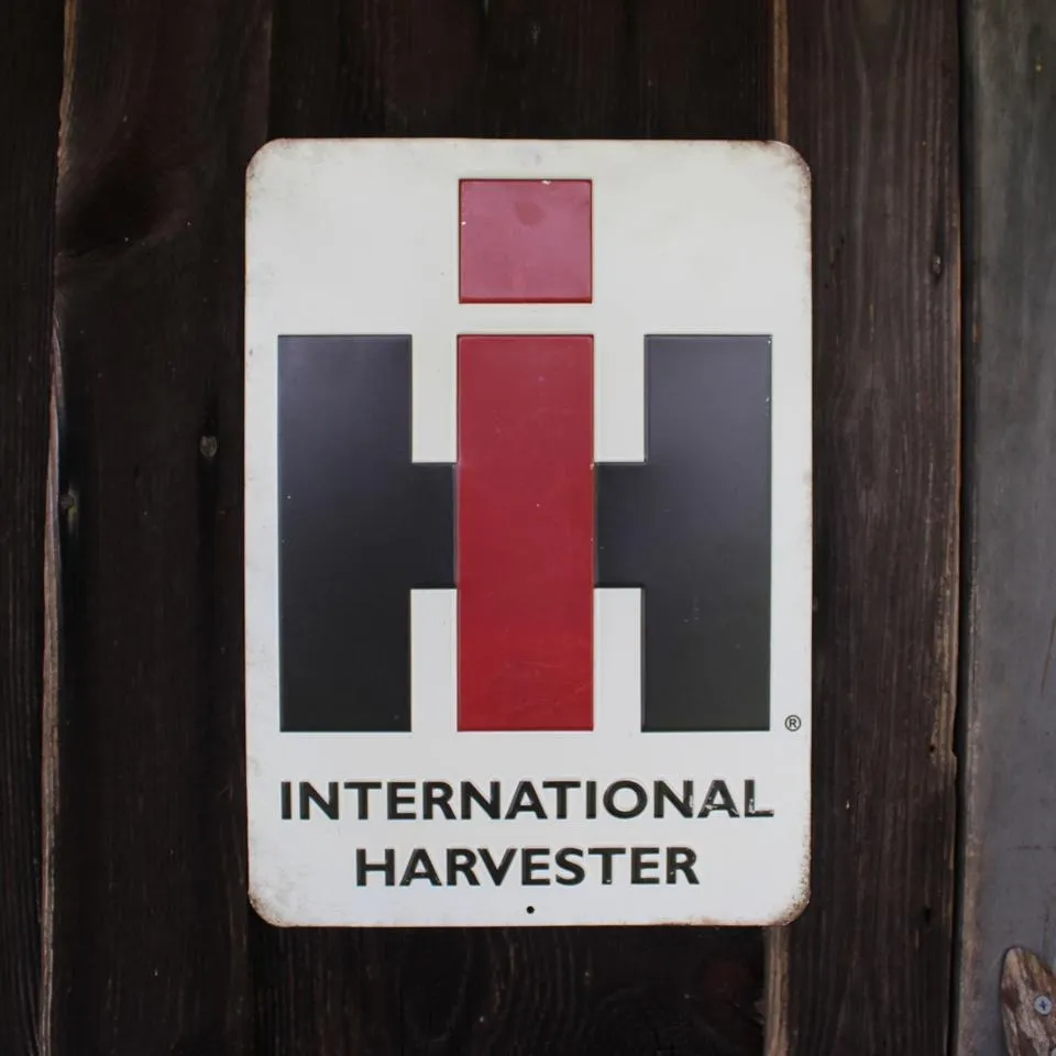IH Logo Embossed 10" x 14" Tin Sign