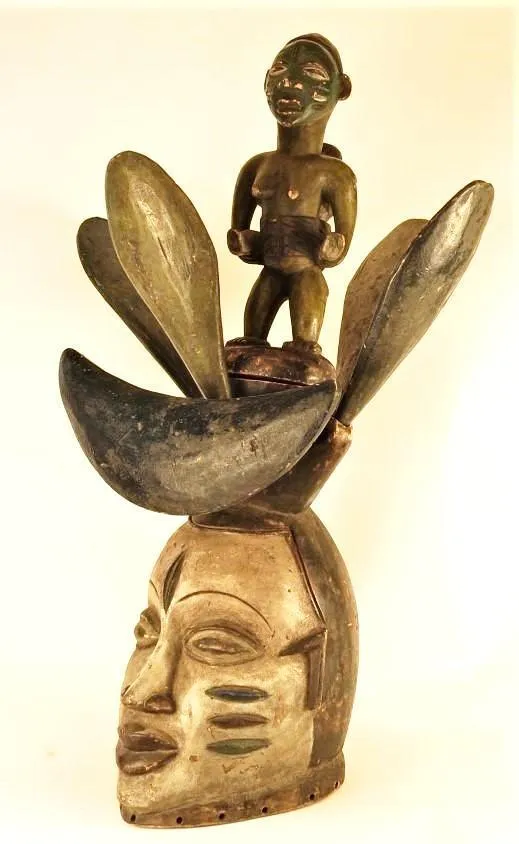 Rare Yoruba Mask with 4 Removable "Petals" and Ancestral Mother and Baby Figure