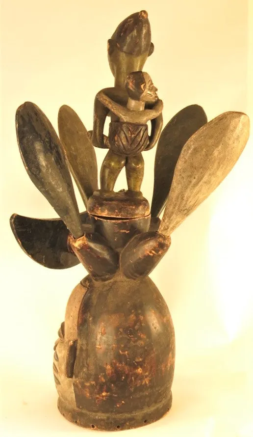 Rare Yoruba Mask with 4 Removable "Petals" and Ancestral Mother and Baby Figure