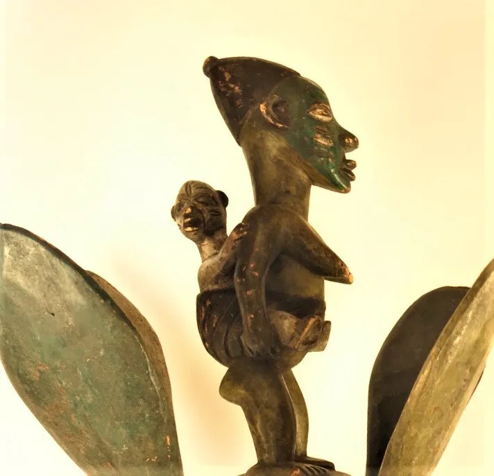 Rare Yoruba Mask with 4 Removable "Petals" and Ancestral Mother and Baby Figure