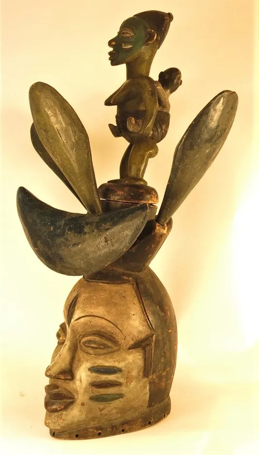 Rare Yoruba Mask with 4 Removable "Petals" and Ancestral Mother and Baby Figure